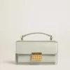 Bolso Venezia pequeño en piel granulada gris mineral con detalles dorados