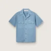 Camisas unisex de denim azul claro con bordado en la espalda