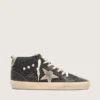 Mid Star para mujer en negro brillante con estrella y lengüeta del talón de ante gris paloma