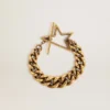 Pulsera de cadena escalonada en oro antiguo con cierre en forma de estrella