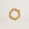 Pulsera de cadena tejida en color oro antiguo con cierre en forma de estrella