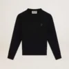Sudadera negra de la Star Collection con una estrella tono sobre tono en la parte delantera