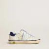 Super-Star Junior en piel blanca con lengüeta de ante azul en el talón