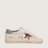 Super-Star para hombre en piel blanca con estrella de piel laminada en color burdeos