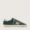 Super-Star para mujer en ante verde, con estrella plateada brillante y lengüeta de cuero en el talón