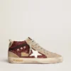 Zapatillas Mid Star para mujer en color burdeos brillante con inserciones grises y estrella blanca