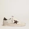 Zapatillas Stardan para mujer en piel blanca con estrella marrón brillante y lengüeta en el talón