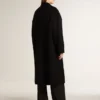 Abrigo negro de corte cocoon de una sola botonadura para mujer