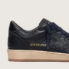 Ball Star para hombre en piel azul marino con estrella de piel tono sobre tono
