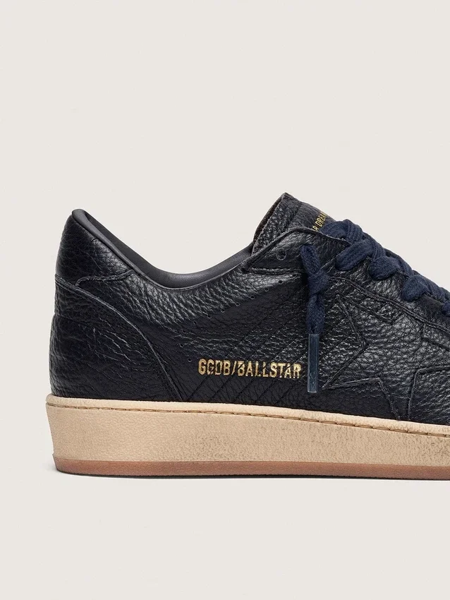 Ball Star para hombre en piel azul marino con estrella de piel tono sobre tono