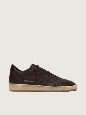 Ball Star para hombre en piel marrón oscuro con estrella de piel tono sobre tono