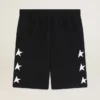 Bermudas negras de hombre con estrellas blancas