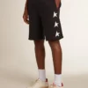 Bermudas negras de hombre con estrellas blancas