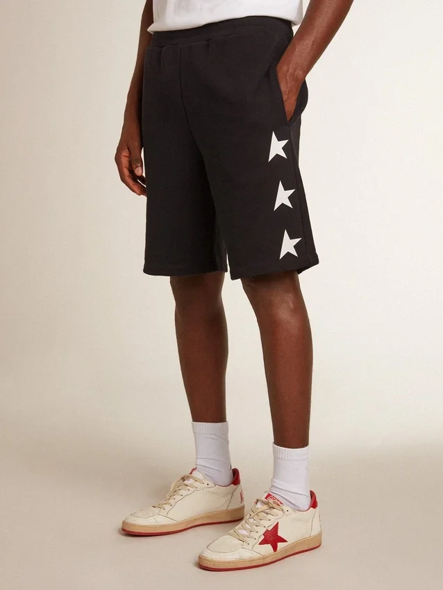 Bermudas negras de hombre con estrellas blancas