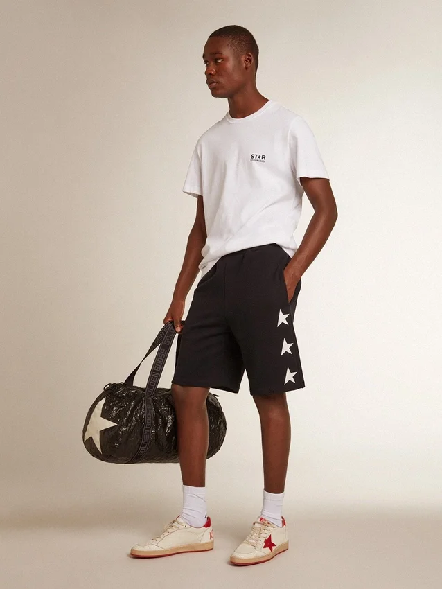 Bermudas negras de hombre con estrellas blancas