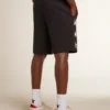 Bermudas negras de hombre con estrellas blancas