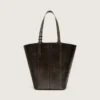 Bolso 24/7 North South en piel envejecida negra con asas ajustables