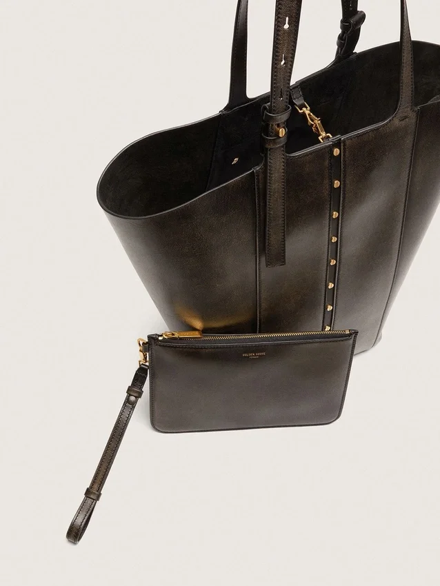 Bolso 24/7 North South en piel envejecida negra con asas ajustables