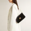 Bolso Gioia en piel negra con detalles dorados