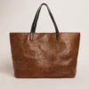 Bolso Pasadena de piel martillada con estampado de leopardo y asas negras a contraste
