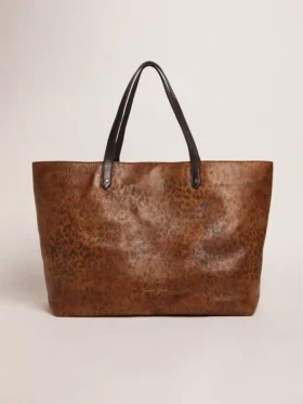 Bolso Pasadena de piel martillada con estampado de leopardo y asas negras a contraste