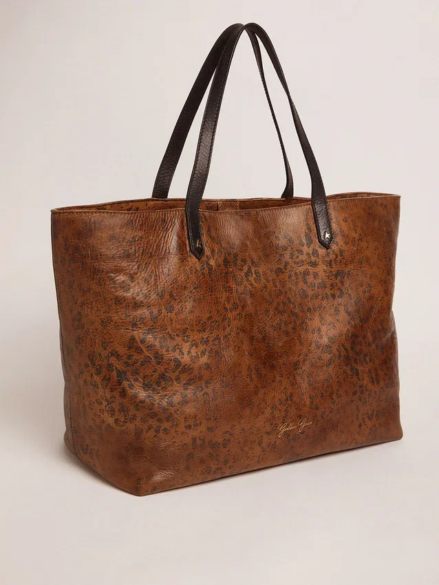Bolso Pasadena de piel martillada con estampado de leopardo y asas negras a contraste
