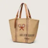Bolso tote «24.7» de rafia natural y piel marrón con detalles metálicos dorados