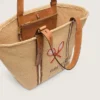 Bolso tote «24.7» de rafia natural y piel marrón con detalles metálicos dorados