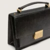 Bolso Venezia en piel envejecida negra con detalles dorados