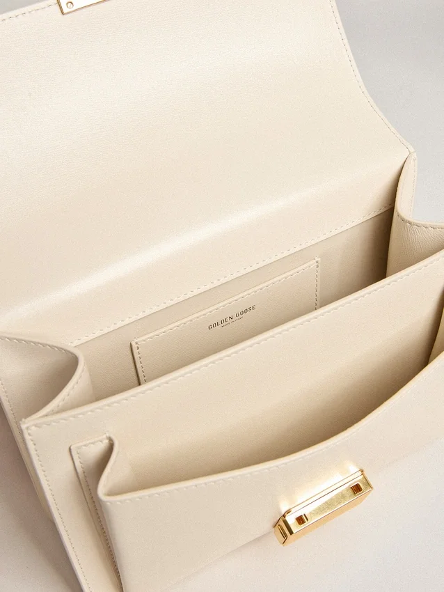 Bolso Venezia en piel repujada color mantequilla con doble colgante