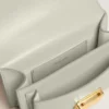 Bolso Venezia pequeño en piel granulada gris mineral con detalles dorados