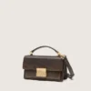 Bolso Venezia pequeño en piel marrón oscuro con hebilla dorada