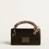 Bolso Venezia pequeño en piel metalizada negra con detalles negros