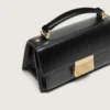 Bolso Venezia pequeño en piel negra con detalles dorados