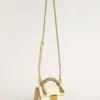 Bolso Venezia pequeño en piel repujada color mantequilla con fular trenzado