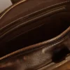 Bolso Vita en piel envejecida negra con detalles dorados