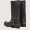 Botas moteras altas de mujer en piel negra con correa y hebilla plateada