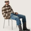 Botas moteras altas para hombre de piel negra con correa y hebilla plateada