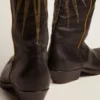 Botas Wish Star de piel negra con estrella incrustada de piel laminada en platino