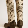 Botas Wish Star en piel negra y blanca con incrustaciones de rosas y estrellas