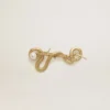 Broche con forma de serpiente en color oro antiguo