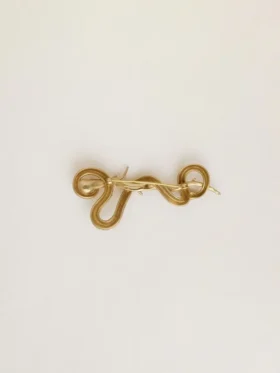 Broche con forma de serpiente en color oro antiguo