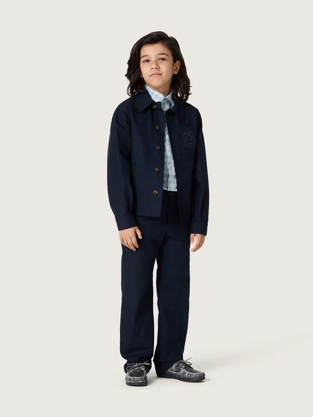 Pantalones chinos unisex «Journey» de lona de algodón azul con logotipo bordado