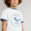 Camisas blancas para niños con estampado azul