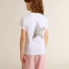 Camisas blancas y plateadas con logotipo y estrella grande con purpurina plateada