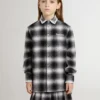 Camisas infantiles a cuadros blancos y negros con bordados blancos