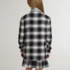 Camisas infantiles a cuadros blancos y negros con bordados blancos