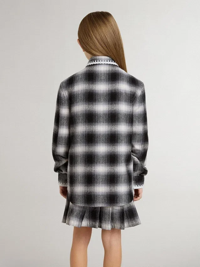 Camisas infantiles a cuadros blancos y negros con bordados blancos
