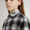Camisas infantiles a cuadros blancos y negros con bordados blancos