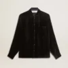 Camisas negras con efecto terciopelo y bordados